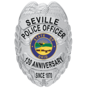 a badge for police in silver color